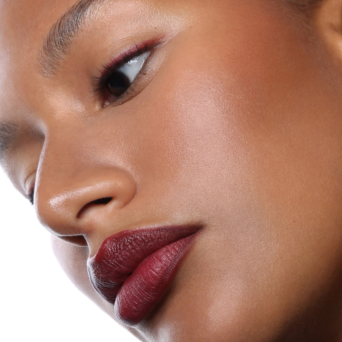 Bang Balm Do Not Disturb, worn on the cheek, with Eternal Matte No Refund and Eternal Pencil Late Check-Out